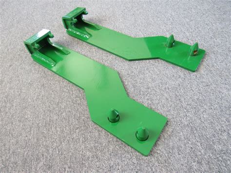 skid steer loader brackets|bolt on brackets.